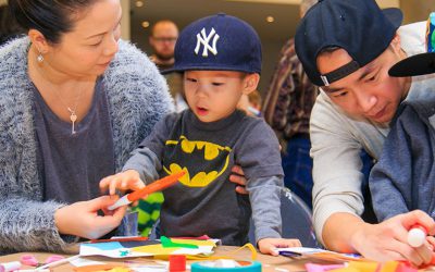 AGO-family Parents help their kids with crafts at the AGO.